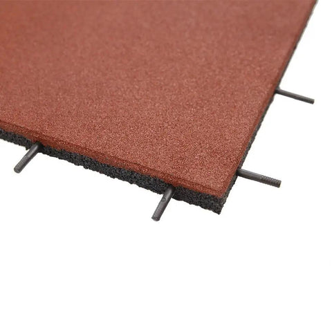 Close-up of interlocked outdoor rubber tiles, showing 1-inch thickness and interlocking design for playground and backyard gym flooring.