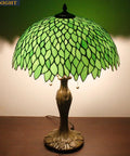 Green Stained Glass Lampshade Replacement, 16 Inch Wide by 7 Inch High, Vintage Wisteria Pattern on a table lamp.