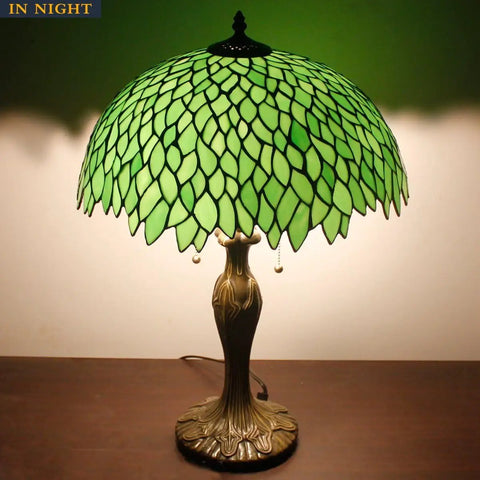 Green Stained Glass Lampshade Replacement, 16 Inch Wide by 7 Inch High, Vintage Wisteria Pattern on a table lamp.