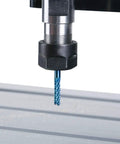 Close-up of a CNC machine with a nano blue-coated end mill, part of a 10-piece Nano Blue Coat End Mills Set For CNC Router Bits.