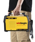 Person holding Dual Voltage Arc Welding Machine 100V To 240V With Digital Display 165A Max Heavy Duty Stick Welder