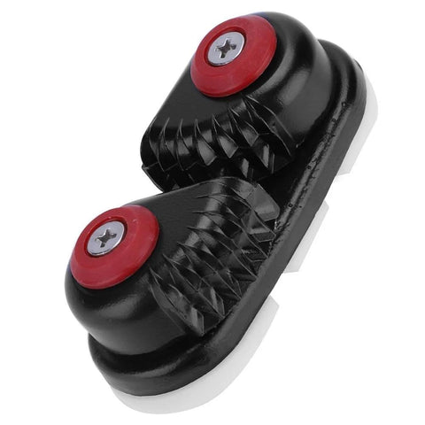 Close-up cam cleat rope clutch, aluminum body with dual red screw caps, black finish