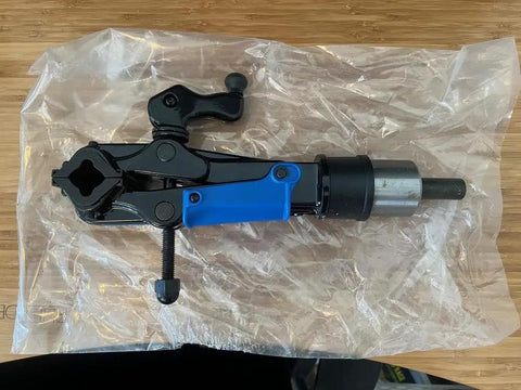 Pro Grade Wall Mount Bike Stand With Heavy Duty Clamp And Locking System, blue and black clamp on wooden table