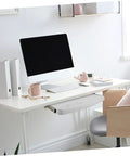 Heavy Duty Sliding Keyboard Tray Smooth Glide Under Desk Mount seen in a modern home office setup with an iMac and accessories.
