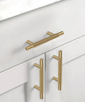 Champagne Bronze Knurled 3 Inch (76mm) Cabinet Handles 10 Pack on white kitchen cabinets.