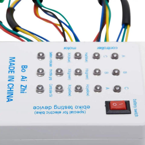 Slick Electric Bike Scooter Brushless Controller Tester Diagnostic Rig Checks 24V 36V 48V 60V 72V Motor Coils with multiple connection pins and battery switch.