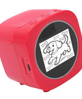 AI Sticker Printer With Voice Activated Label Maker And Thermal Printing Tech For Scrapbooking Perfect For Kids Adults With 2.4 Inch Display Rechargeable Battery For Family Game Nights showing a red printer with a dog graphic.
