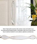 10 Pack Ivory White Cabinet Pulls Three Point Eight Inch Vintage Aluminum Alloy Drawer Handles installed on kitchen cabinet.