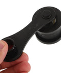 Swetrace Heavy Duty Chain Tensioner Pulley Kit Makes Your 50-250cc Bike Smoother, Prevents Chain Slap And Keeps You Safe On The Dirt Or Track For Any Off Road Ride. black metal chain tensioner pulley with hand-held close-up