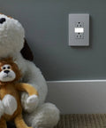 Five Level Adjustable LED Night Light Outlet In White Finish Tamper Resistant Electrical Outlet in room with teddy bears