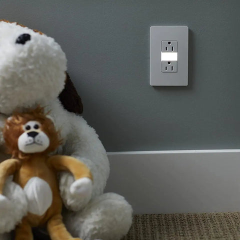 Five Level Adjustable LED Night Light Outlet In White Finish Tamper Resistant Electrical Outlet in room with teddy bears