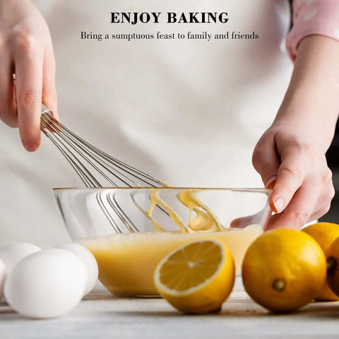 Go-To Stainless Steel Balloon Whisk in use with lemon and eggs for baking, showing 8-inch durable wire whisk blending batter in glass bowl.