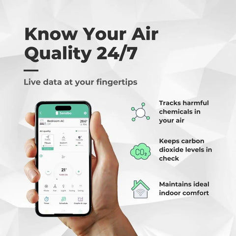 Person holding smartphone displaying app interface for Smart Air Conditioner Controller With Built-In Air Quality Sensor