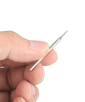 Person holding a bit from the 20 Piece Diamond Hole Saw Bits Set With Cylindrical Head 80 Grit For Gems Glass Jade Emerald 1 Millimeter Diameter
