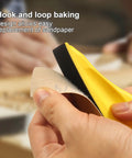 Close-up of Go To 3.5 Inch By 1 Inch Sanding Block With 70 Piece Sandpaper Set showing hook and loop design for sandpaper attachment.