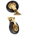 Heavy Duty 8 Inch Pneumatic Rubber Tires For Hotel Luggage Carts Smooth Rolling Brass Hub With Gold Plated Rust Proof Silent Glide Ride Built Tough To Last mounted to a cart.