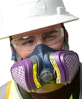Worker wearing Elipse OV AG P100 Respirator Mask For Acidic And Organic Gases And Vapors Medium Large Size in chemical environment