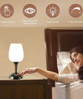 Set of 2 Space Saving Small Touch Bedside Table Lamps, 3 Way Dimmable With White Opal Glass Shades, on nightstand next to woman