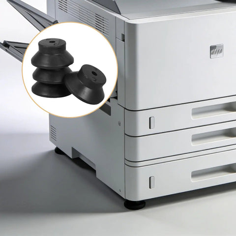 Ultimate 3D Printer Vibration Dampening Feet Pads In Black With Secure M6 Screws displayed next to a printer.