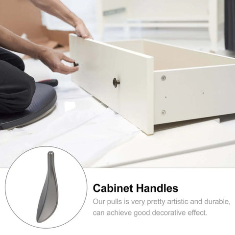 Installation of Dope Loquat Leaf Zinc Alloy Cabinet Pulls And Drawer Handles Set In Pearl Gray Finish on a white drawer