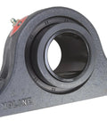 Pillow block bearing with gray cast-iron housing and black inner bore; TIMKEN branding visible.