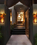 Set Of Two Sunflower Mason Jar Wall Sconces With Remote Control, Farmhouse Wall Decor illuminating an entryway at dusk