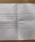 Sheet of paper with multilingual safety warnings for adult supervision.