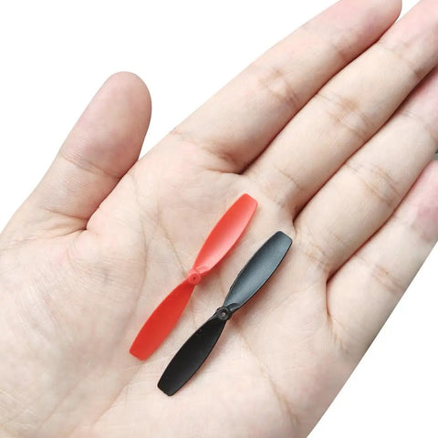 Red and black 55mm RC Propellers Set 2-Vane CW CCW Black Red For Micro Drones And Mini Quadcopters on hand
