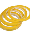 Four Pack Yellow Heat Resistant Paper Tape Featuring A Dang Tough Hold That Takes The Heat Without Breaking A Sweat displayed in stacked rolls.