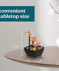 Tabletop Water Fountain With Three Tiers For Indoor Zen Waterfall Vibe, Natural River Rocks, Quiet Submersible Pump, Calming Desk Decor For Home Or Office, AA Battery Powered, 8 inch height, 4.75 inch width, displayed on table