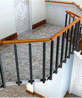 Tough As Nails Side Mount Banister Posts Black Metal Deck Railing Spindles with heavy duty brackets on a staircase.