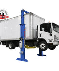 Boss Shop Two Post Auto Lift With 15000 Pound Capacity lifting a truck, showcasing sturdy design and hydraulic components.