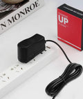 Replacement Cord Wall AC Power Adapter For Casio WK245 WK240 Workstation Keyboard plugged into power strip with box