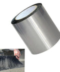 Beefy Aluminum Foil Asphalt Waterproof Tape For Rock Solid Roof Repair, 1.64Ft by 16.4Ft roll with hands using patch