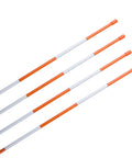 Four orange and white fiberglass poles from 50 Pack 48 Inch Driveway Marker Set With 1/4 Inch Fiberglass Reflective Snow Stakes