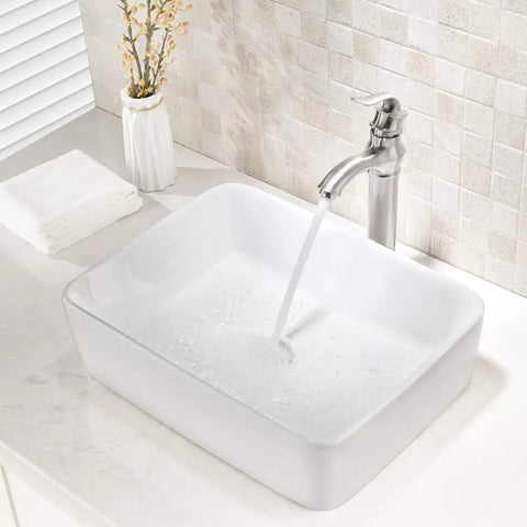Rectangle Vessel Sink And Faucet Combo For Modern Bathrooms White Above Counter Basin 19 By 15 Inch Vanity Set With Brushed Nickel Faucet And Pop Up Drain Sleek Upgrade For Your Bathroom Daily Routine, water flowing into white sink with nickel faucet.