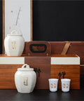 Top Shelf Ceramic Storage Jars With Lids Airtight Double Pantry Set Including Two Matching Teacups for tea and spices.