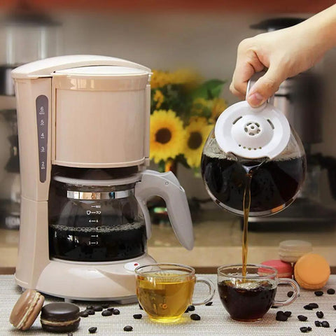 Zero Hassle Full Automatic Bean To Cup Coffee Maker pouring coffee into cups with a compact white design for home or office use.