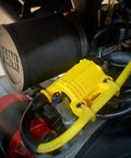 Universal High Performance Ignition Coil installed on engine, visible wires and components, fits street bikes dirt bikes ATVs GY6 scooters 6V 12V 24V