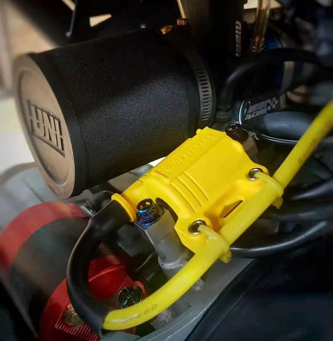 Universal High Performance Ignition Coil installed on engine, visible wires and components, fits street bikes dirt bikes ATVs GY6 scooters 6V 12V 24V