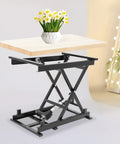 Stylish Compact Electric Lift Coffee Table With Quiet Motor And Wireless Remote For Small Spaces, Durable Folding Frame showcasing a wooden top and black scissor lift base.