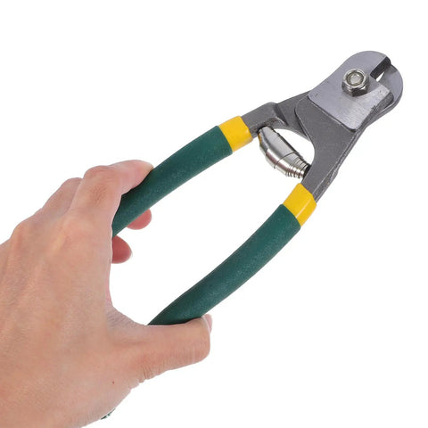 Pro Multi-Functional Cable Stripping Pliers With Ergonomic Handle For Precise Wire Gauge Adjustment held in hand.