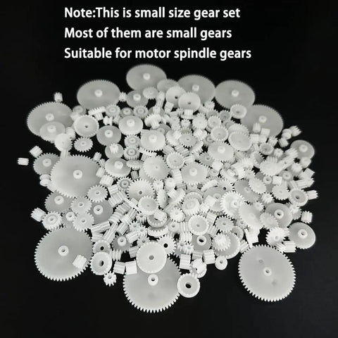 Assorted small white gears from 200 Piece Module 0.5 Plastic Gear Set With Single Gear Worm Gear Crown Gear Spindle Gear For DC Motors