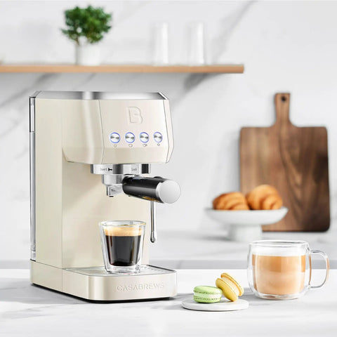 Barista Worthy Home Espresso Machine With 20 Bar Pressure, Stainless Steel Coffee Maker, Cream Finish on kitchen counter.