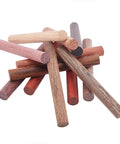 Premium Grade Wood Pen Blanks And Dowel Rods 12 Assorted Colors half inch by four inch turning blocks for lathes stacked together.