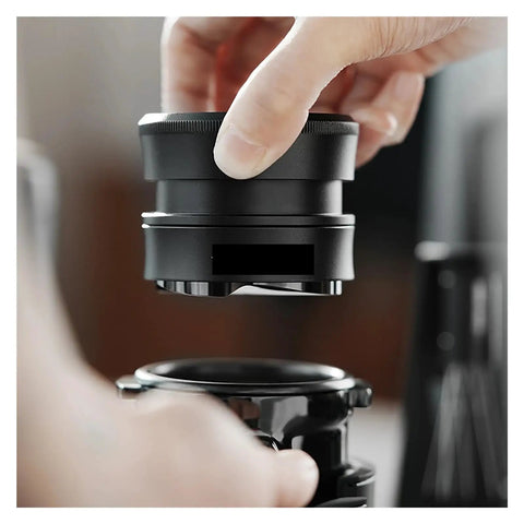Hella Smooth Espresso Bed Leveler Cyclone Coffee Distributor Spinner being positioned above portafilter for brewing.