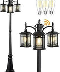 Automatic Dusk To Dawn Outdoor Lamp Post Lights in black with clear glass panels, three-head, for backyard patio garden decor.