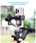 Person holding Pro Level Smartphone Gimbal With 3-Axis Stabilization, AI Tracking, cooling fan, and 2Kg payload, mounted with phone.