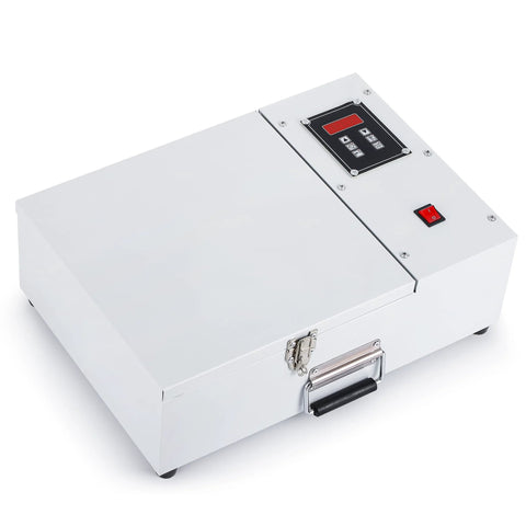 Front view of white metal bearing induction heater box with digital control panel and red power switch.