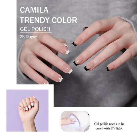 Hands with French tips and black accents using Six Piece 15ml Gel Polish Set In Black And White Non Toxic HEMA Free Toluene Free Soak Off Gel Nail Polish Kit For Easy Manicure And Salon Quality Nails At Home For Women.